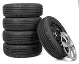 Closeup of five tires with wheel cap