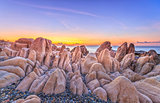 Ancient rock plain dawn coastline