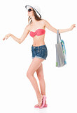 Girl in bikini with summer hat