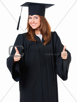 Graduate girl in mantle showing thumb