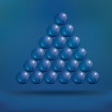 Transparent Soap Bubbles in Pyramid on Blue Background.