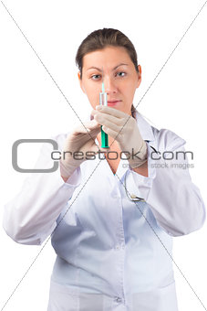 beautiful girl in medical clothing with a syringe