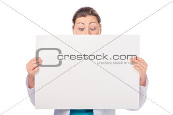 woman with a poster looking down isolated on white background
