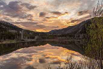 sunset lake reflection calm water
