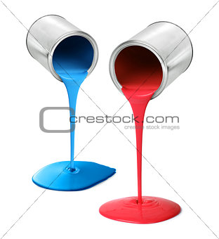 Metal tin cans pouring red and blue paint