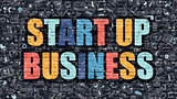 Start Up Business Concept. Multicolor on Dark Brickwall.