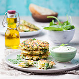 Cabbage and spinach pancakes with yogurt dressing