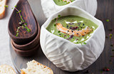 Broccoli, spinach cream soup, shrimp, wooden board