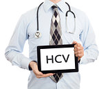 Doctor holding tablet - HCV
