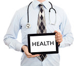 Doctor holding tablet - Health