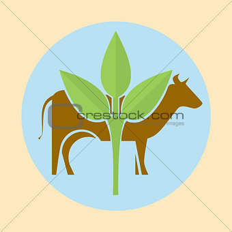 Cow silhouette and green leaves