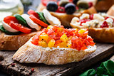 Bruschetta with chopped tomatoes, herbs and oil