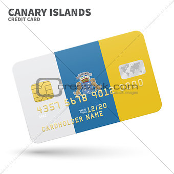Credit card with Canary Islands flag background for bank, presentations and business. Isolated on white