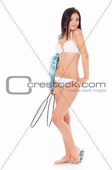 Girl in bikini with tennis-racket
