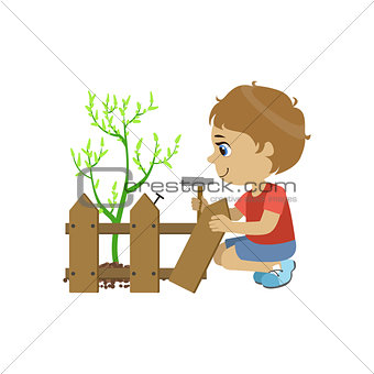 Boy Fixing The Fence