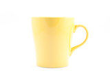 Yellow mug isolated on white background