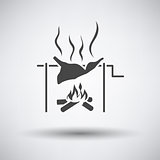 Roasting meat on fire icon