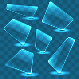Set of transparent glass plates on a blue background.