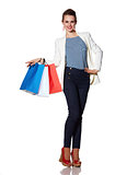 Happy young woman with French flag colours shopping bags