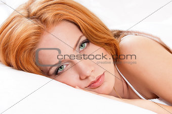 Girl is sleeping on bed