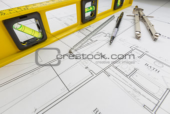 Construction Level, Pencil, Ruler and Compass Resting on House P