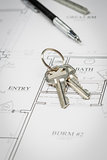Engineer Pencil, Ruler and Keys Resting On House Plans
