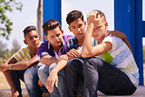 Group Of Teenagers Boys Supporting Comforting Friend