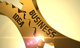 Golden Metallic Gears with Business Idea Concept.