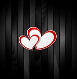 Valentine hearts on black wooden texture background