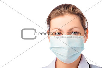 Horizontal portrait of medical worker in a mask isolated