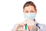 doctor wearing a mask and gloves with syringe