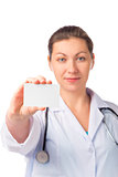 doctor with business card in hand isolated in studio
