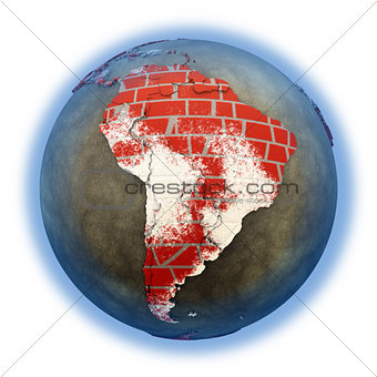 South America on brick wall Earth