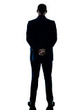 business man standing rear view isolated