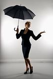 Businesswoman with umbrella.