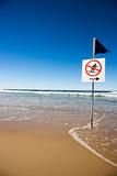 Warning sign on beach.