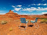 Chairs in desert.