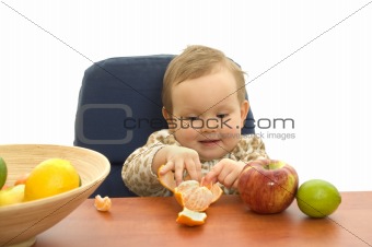Babby eating fruit
