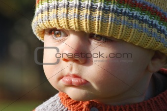 Adorable Toddler in a wooly cap
