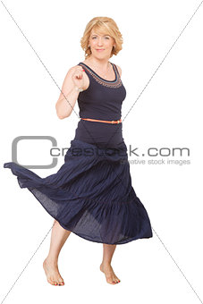 Happy smiling blond woman dances barefoot, isolated on white background