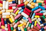 Pharmaceutical background of colorful pills and drugs
