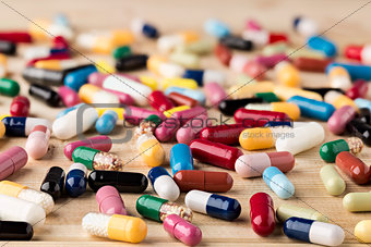 Heap of medicine capsules and pills