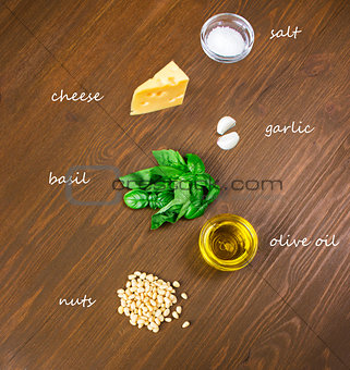 Sicilian pesto ingredients on wooden table