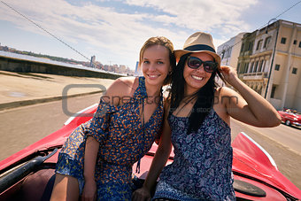 Happy Couple Tourist Girls On Vintage Car Havana Cuba