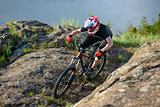 Professional Cyclist Riding the Bike on the Beautiful Spring Mountain Trail. Extreme Sports