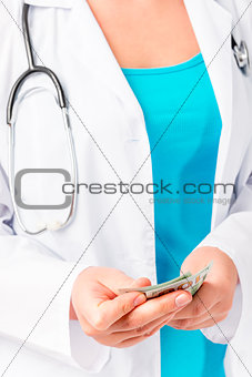 Doctor recalculates his wages, close-up shot
