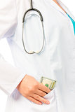 Doctor puts it in his pocket a bribe