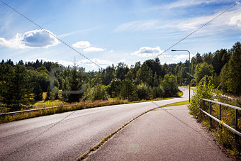 Typical beautiful road in the countryside of Finland