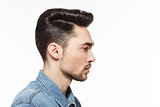 Man with modern hairstyle in studio