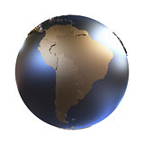 South America on golden metallic Earth
